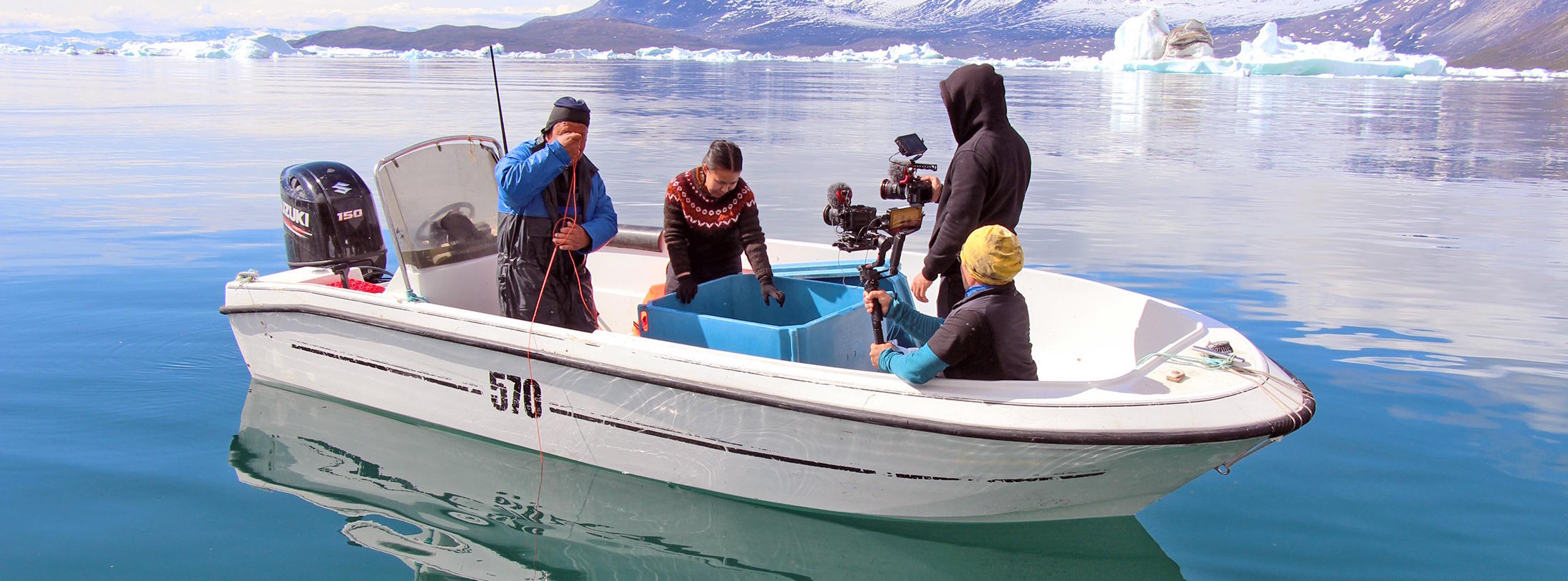 Crew in a boat in Greenland